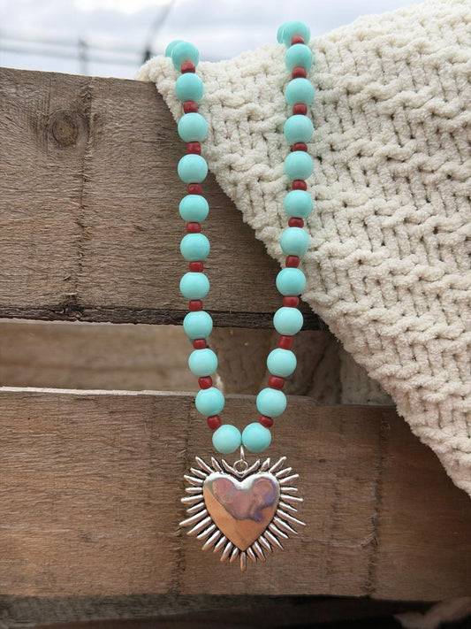 Collar Corazón de los Rayos Celeste
